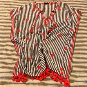 Striped blue and white cover up with orange accents and fringe